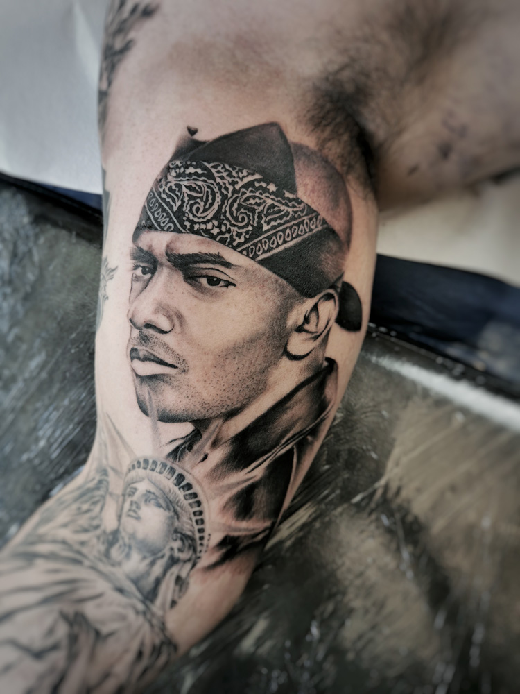 Dago León tattoo realismo
